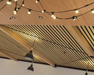 Timber ceiling fit out in shopping centre, using timber battens Austratus Flat Panel Profile