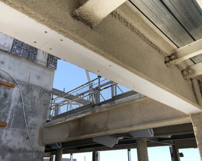 CAFCO 300 - Vermiculite Spray applied to beams and columns of a multi-storey building in construction