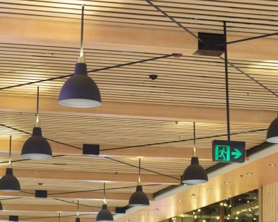 Timber ceiling fit out in shopping centre, using timber battens Austratus Flat Panel Profile